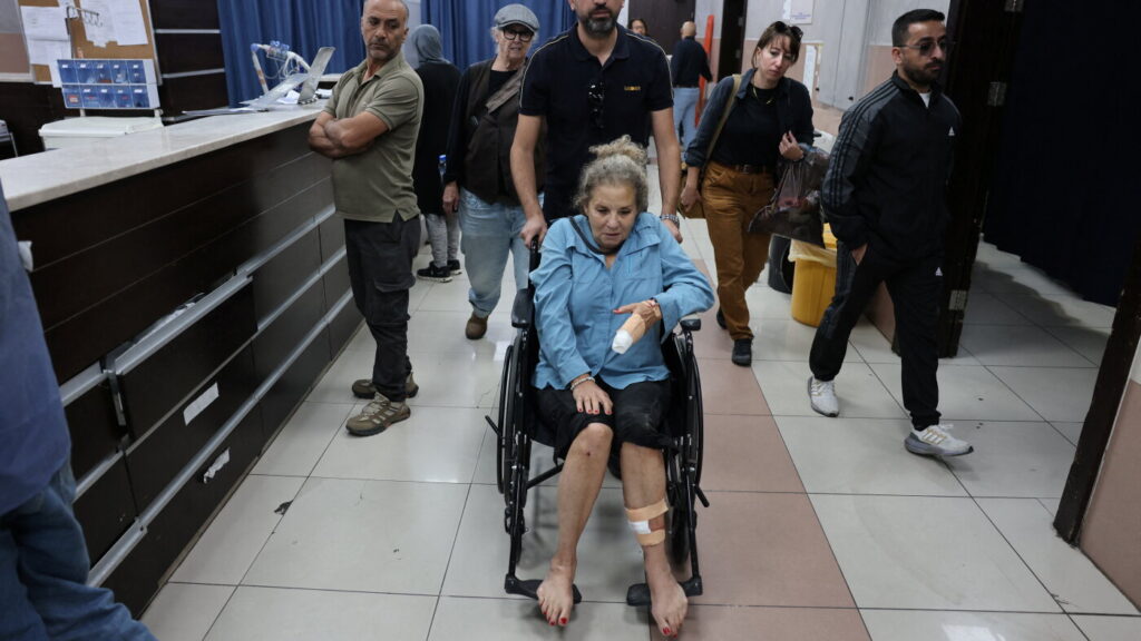Israeli settlers beat Palestinians, U.S. photojournalist in West Bank : NPR Israeli settlers beat Palestinians, U.S. photojournalist in West Bank :