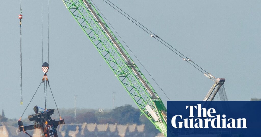 Masts removed from bomb laden WWII ship in Thames in bid