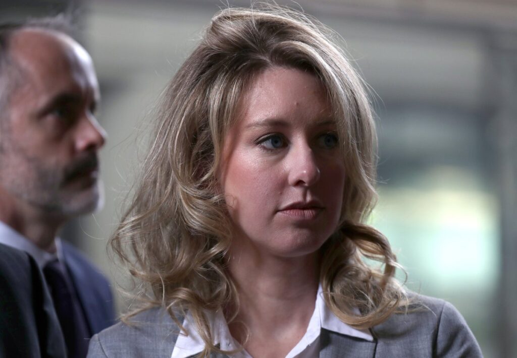 Pretend you're sitting at Elizabeth Holmes' desk on this weirdly
